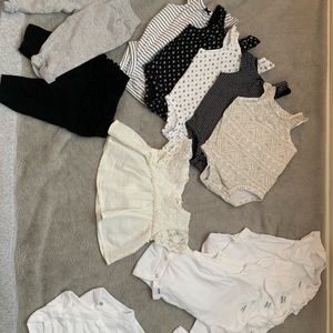 Black, white and neutral color onesies and bottoms
